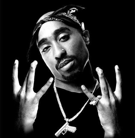 The Rapper 2Pac showing "West Coast" sign