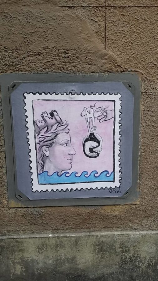 Blub, Street art with a Greek deity Tiche, Pisa, Italy. 
