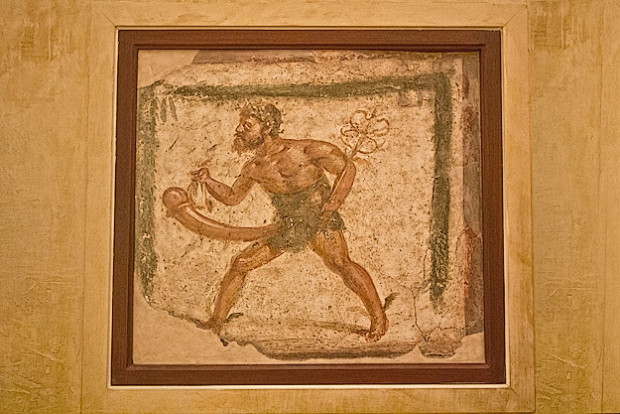 Fresco of Priapus, son of Aphrodite and god of fertility and growth, found in a villa in Pompeii