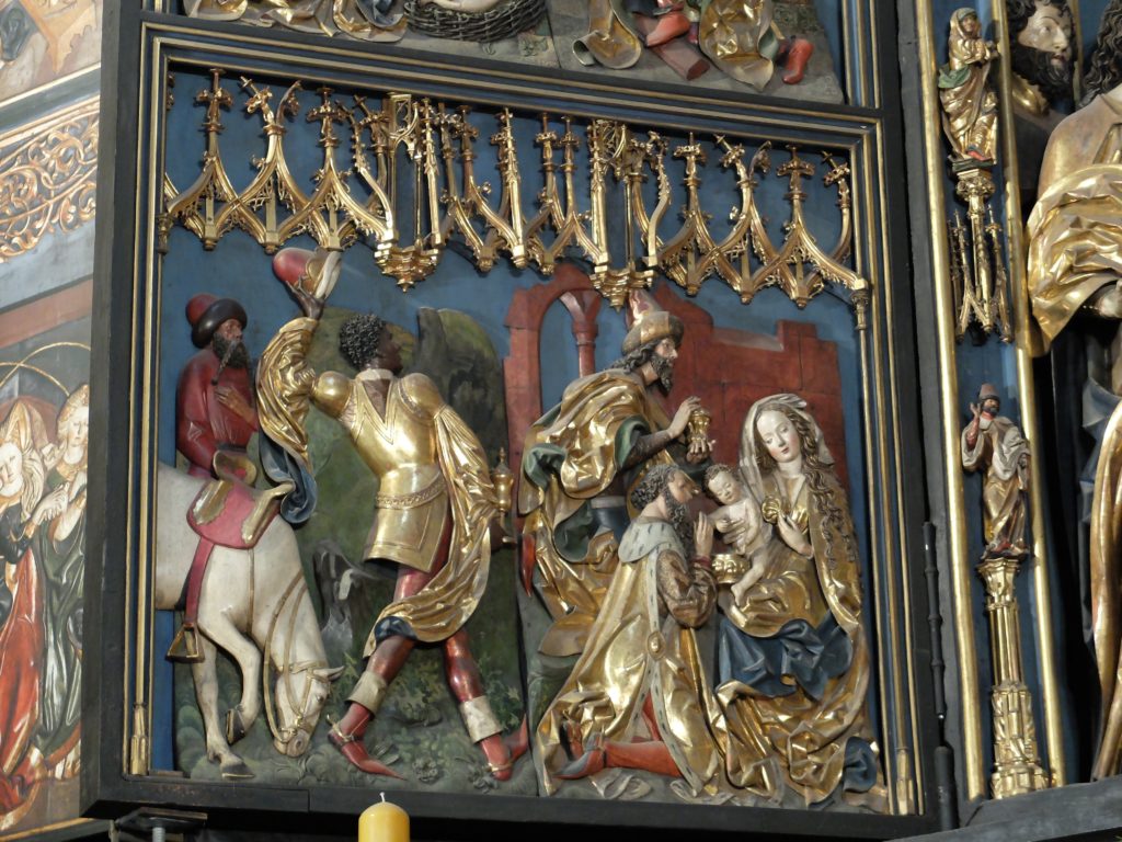 Veit Stoss, Altarpiece, 1489, detail of relief sculpture on left side wing showing the Adoration of the Magi