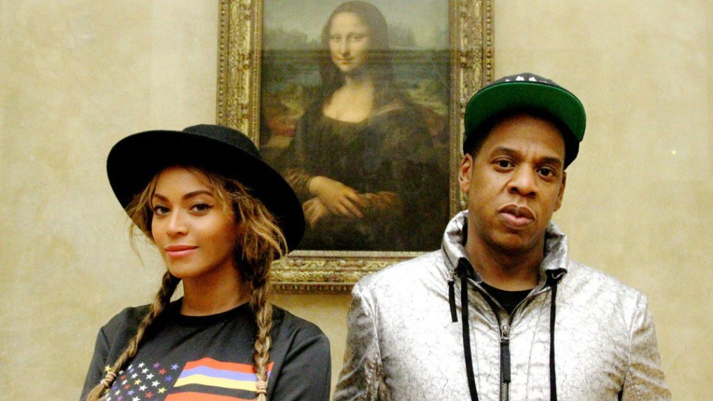 Beyonce and Jay Z in front of Leonardo da Vinci's Mona Lisa, Louvre, Paris, France.