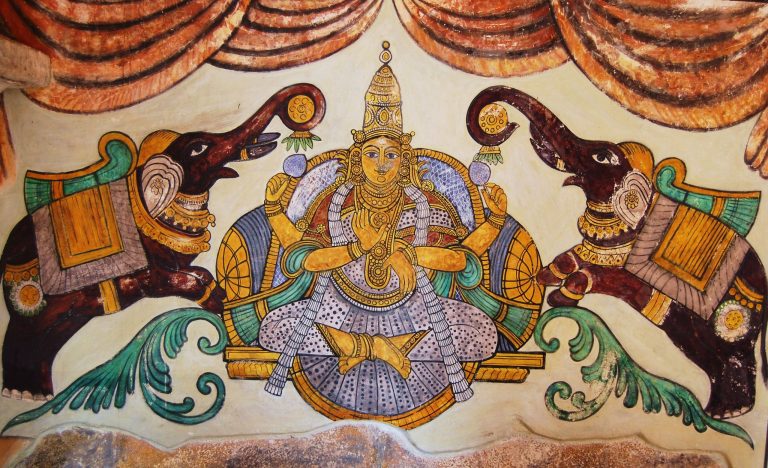 Lakshmi in Art: A painting of Lakshmi on the inner walls of the Tanjore Big temple, Tanjore, India. Wikimedia Commons (public domain).
