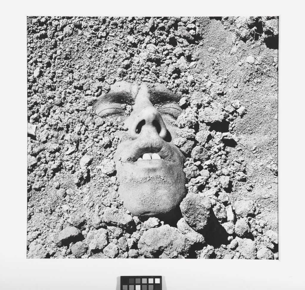 David Wojnarowicz, Untitled (Face in Dirt), 1991 (printed 1993), Collection of Ted and Maryanne Ellison Simmons. Courtesy the Estate of David Wojnarowicz and P.P.O.W, New York, NY, USA.