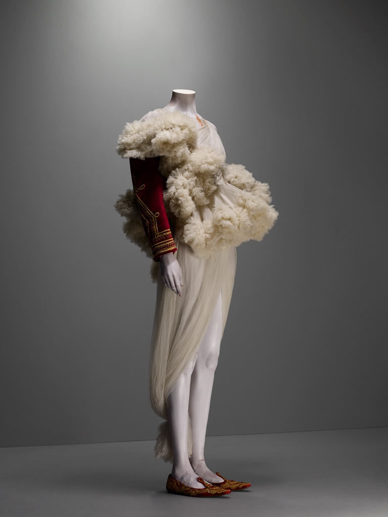 Alexander McQueen, The Girl Who Lived In A Tree collection, F/W 2008-9, Ensemble, jacket of red silk velvet embroidered with gold bullion and trimmed with white shearling; dress of ivory silk tulle, Source: The Metropolitan Museum of Art, New York, USA.