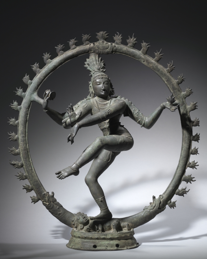 The bronze statue of the Shiva Nataraja with four arms and two legs dancing in the ring with flames in the Cleveland Museum of Art.
