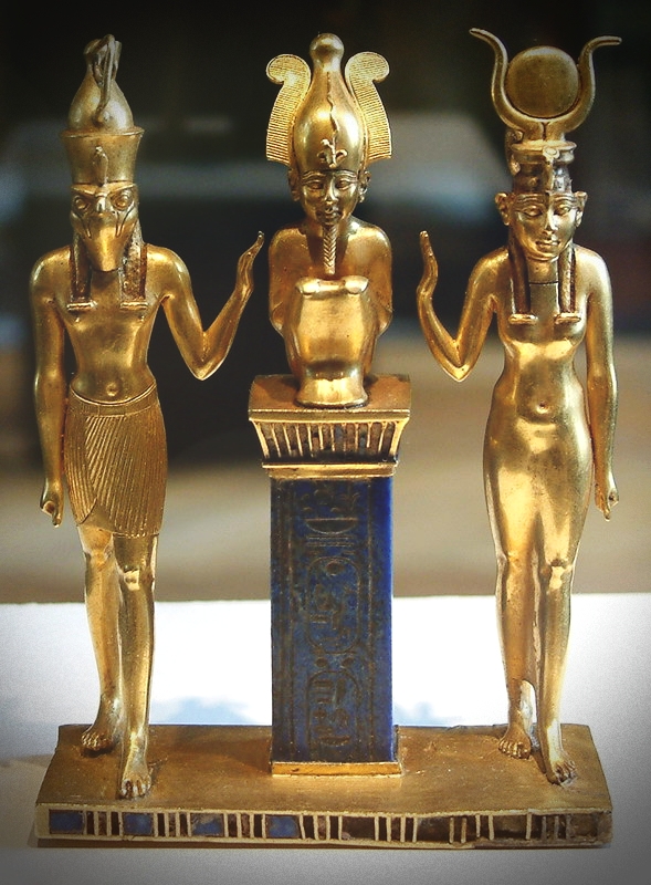 Standing figures of Egyptian gods Osiris, Isis and Horus