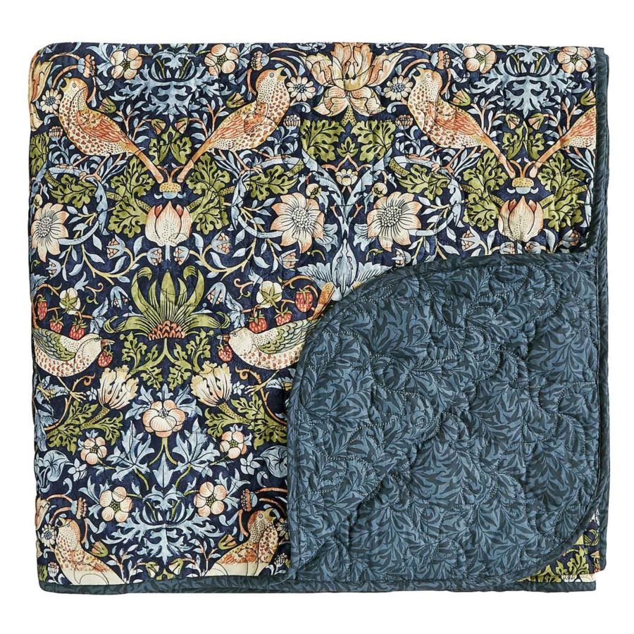 blue quilt with floral design; Prints of William Morris