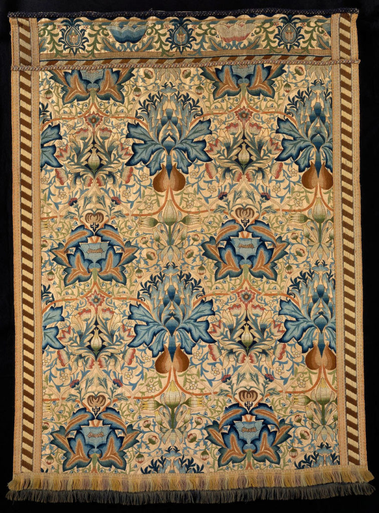 textile wall hanging decoration with blue and brown details