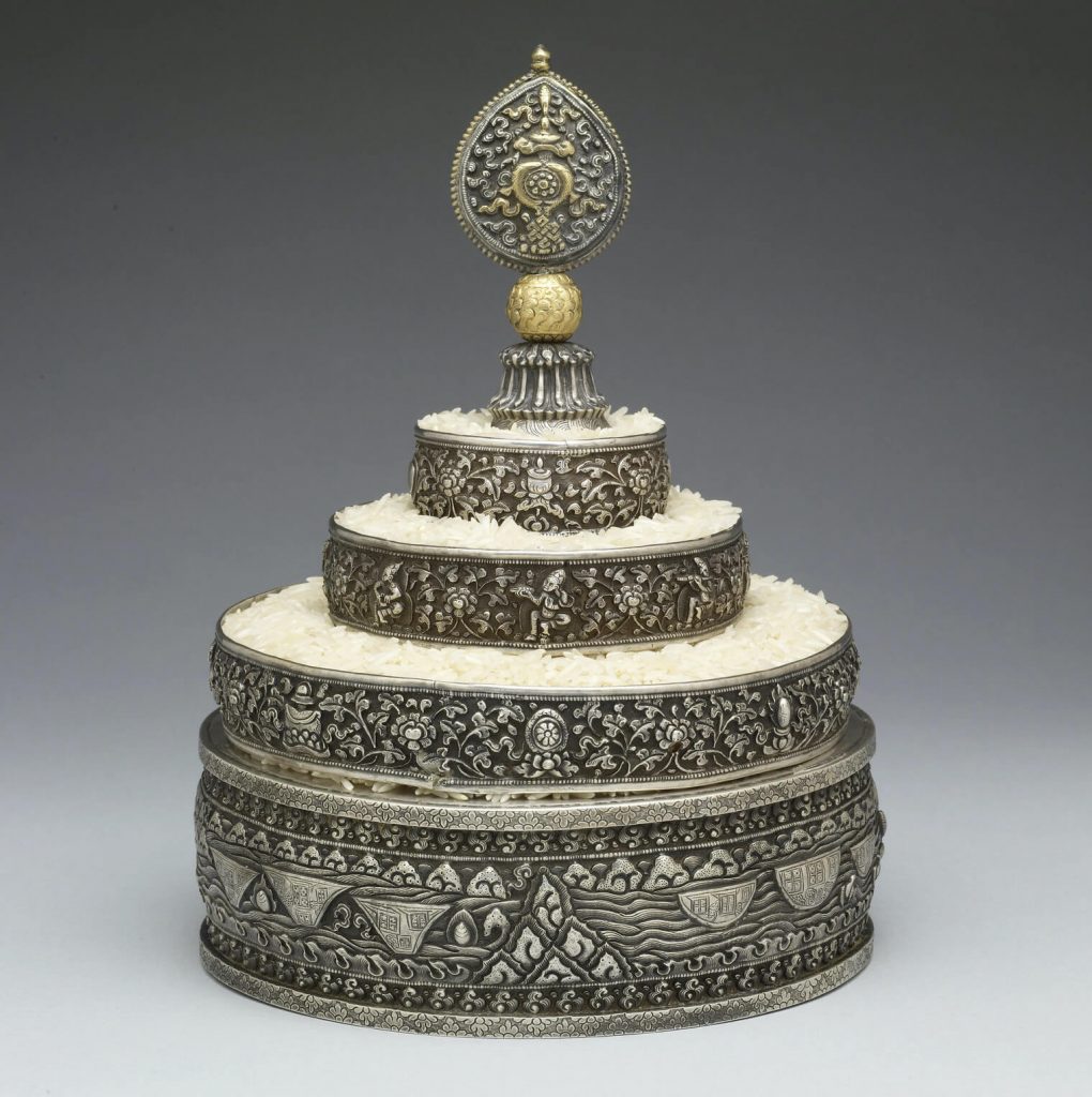 Grain Mandala Set. three-dimenasional sculptural silver mandala with grains on the rings and finial at the top