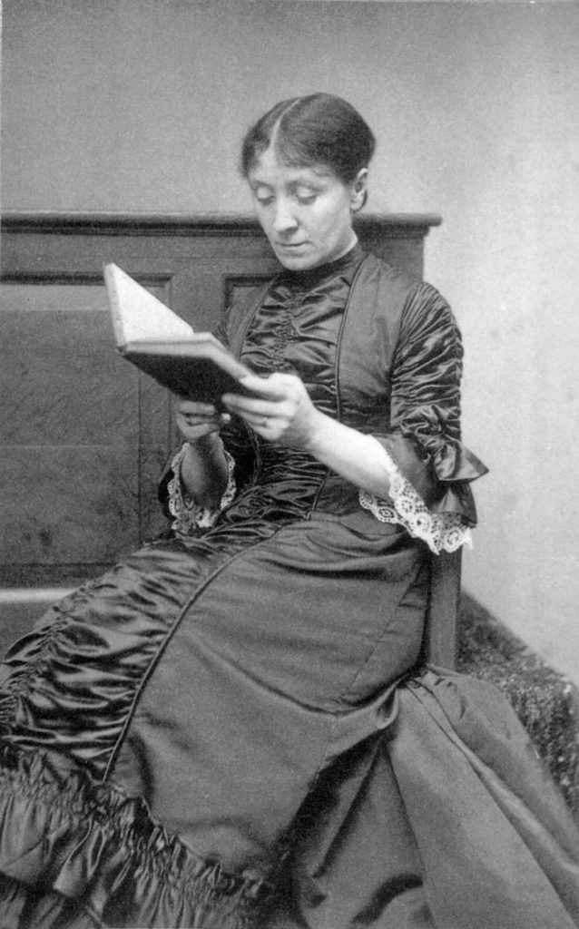A Victorian photograph of Georgiana Burne-Jones, one of the Pre-Raphaelite Sisters, reading.