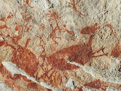 Art History 101: Prehistoric Painting with rust-colored pigment. Jaguar, Tapir, and Red Deer. 