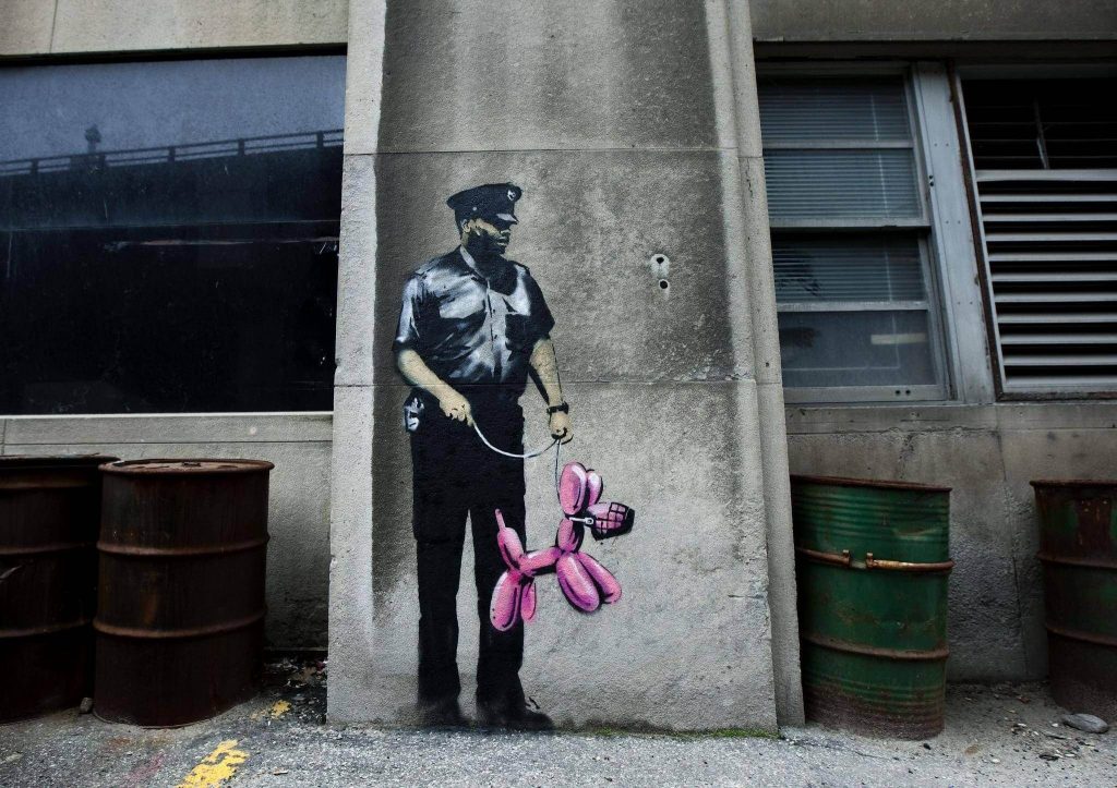 Banksy city guide 2021: Banksy, Guard with balloon dog, 2010