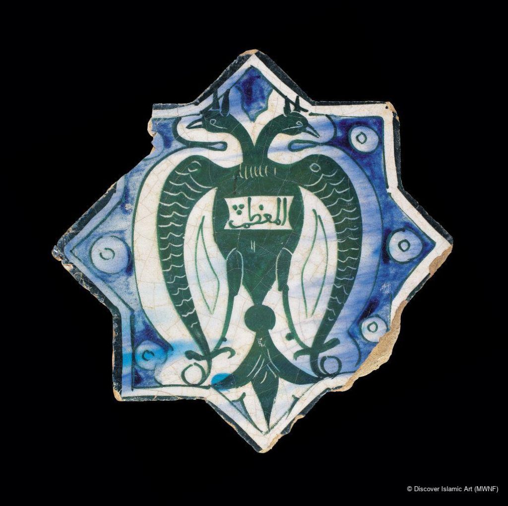 Anatolian Seljuk symbol, the double-headed eagle on star-shaped ceramic tile, underglaze technique. Islamic Art/Museum with No Frontiers.