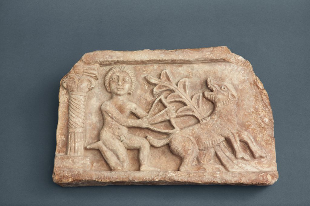 Hunter and prey, ca. 4th – 6th century CE (?). Limestone relief fragment; architectural element, perhaps from Oxyrhynchus. The Nadler Collection. Georgia Museum.