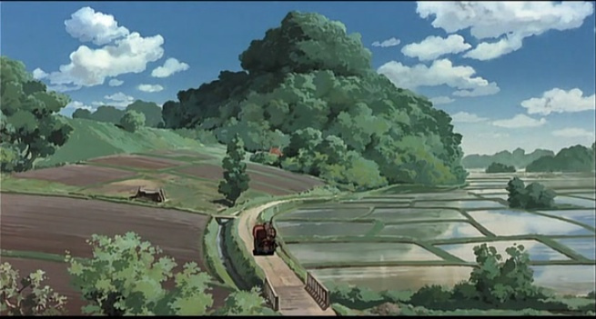 Anime in the prints of Hasui Kawase: Scene from My Neighbor Totoro (1988), dir. Hayao Miyazaki and animated by Studio Ghibli. Depicts a series of fields, with a road down the centre and a car driving down the road.