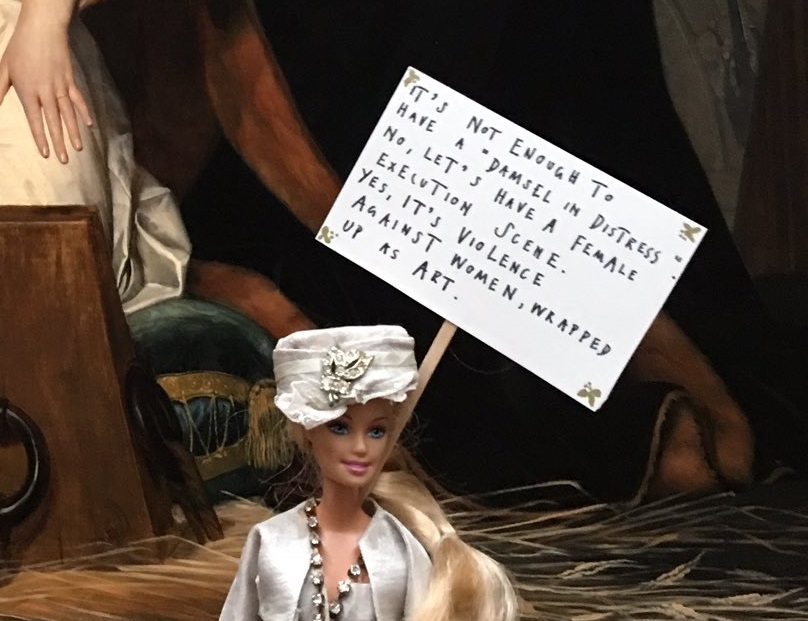 Art Activist Barbie's placard. Detail. @BarbieReports.