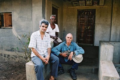 Hervé Perdriolle, Jivya Soma Mashe and Richard Long, front the Jivya Soma Mashe house, Thane District, Maharashtra, 2003