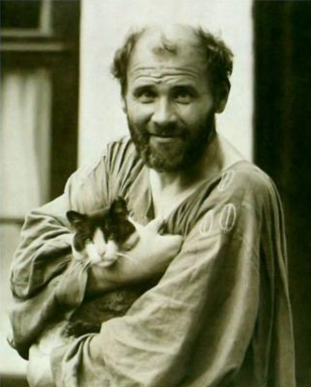 Gustav Klimt with his cat.