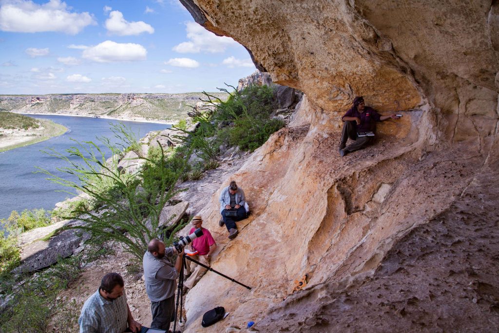 Left to Right: Charles Koenig, Jerod Roberts, Didier Bardon, Karen Steelman, Vicky Roberts. Shumla staff and volunteer document a rock art site located near one of the 3 major rivers in the region, Val Verde County, TX, USA. 