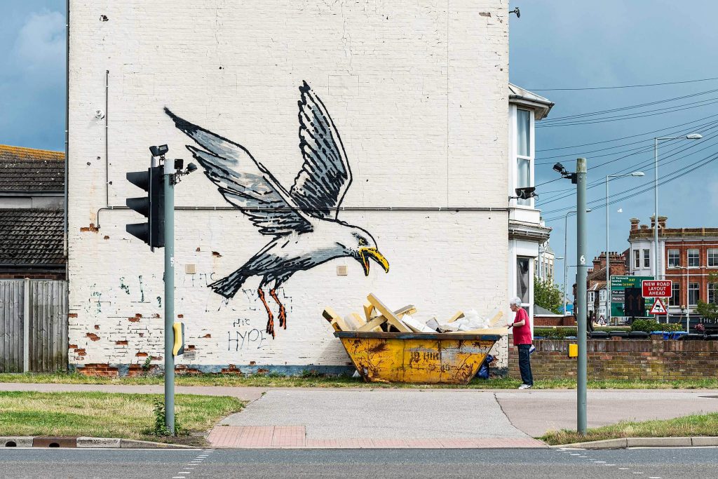 Banksy city guide 2021: Banksy, Gull eating chips, 2021