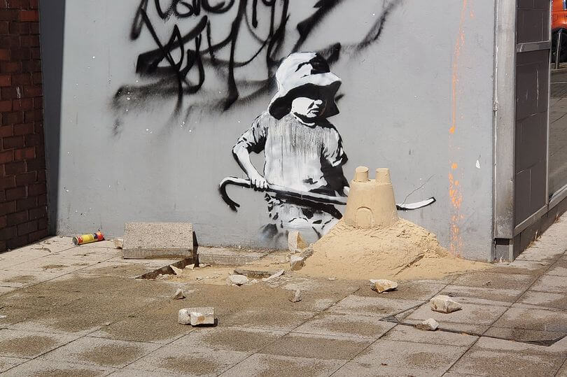Banksy city guide 2021: Banksy, Boy with sandcastle, 2021