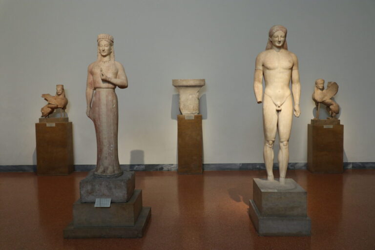 Ancient Greek Kouros and Kore: A Kore and a kouros, two sphinxes and a grave stele, 6th c. BCE, National Archaeological Museum, Athens, Greece. Photograph by George E. Koronaios
