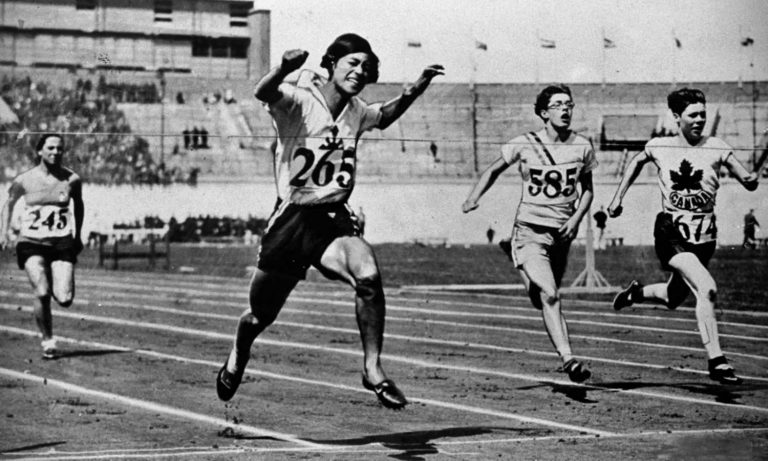 summer Olympics: Kinue Hitomi in the 100-meter heat at the Amsterdam Olympics, 1928. Japanese Olympic Committee.
