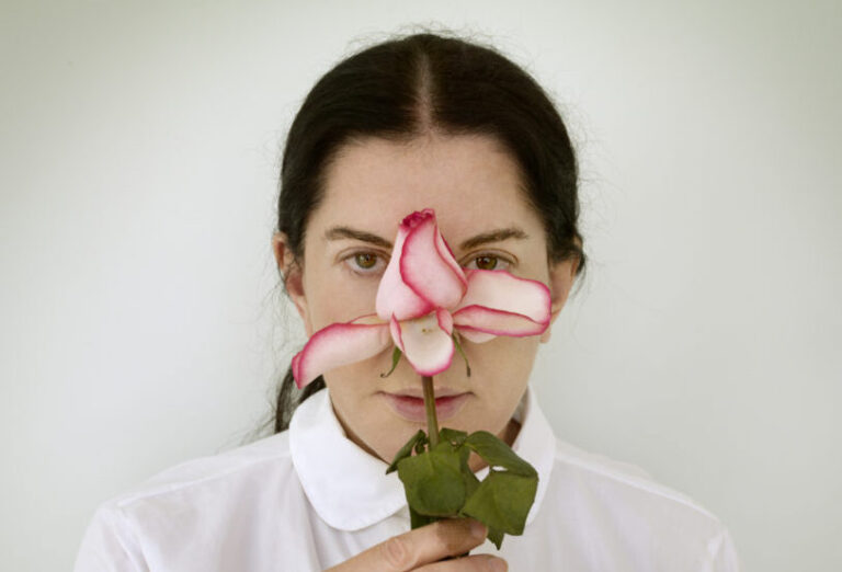 Marina abramović: Marina Abramović, Artist Portrait with a Rose, 2013. Artnet.
