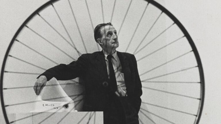 Duchamp Scandalous Artworks: Marcel Duchamp with a bicycle wheel. France Amerique.
