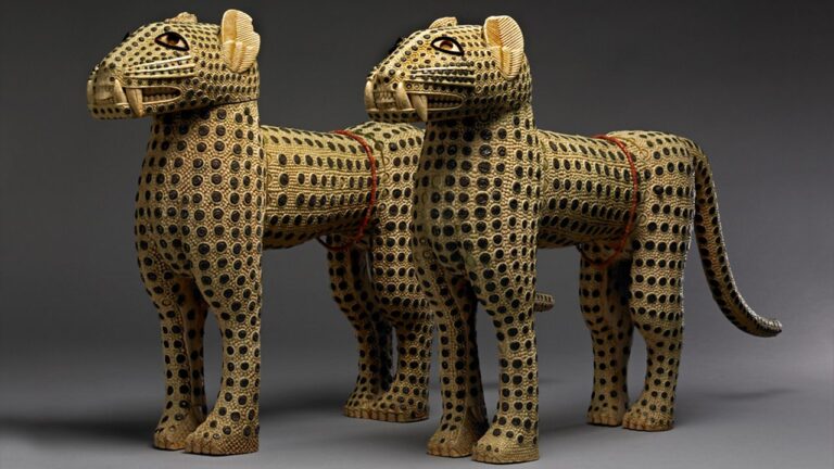 Benin art: Carved leopards, 19th century, ivory, copper, Benin, British Museum, London, UK.
