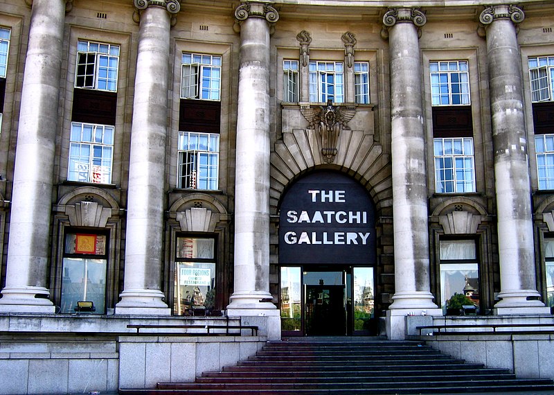 Charles Saatchi: Entrance of the Saatchi gallery at County Hall, London, UK. Photo by C. G. P. Grey via Wikimedia Commons (CC BY 2.0).
