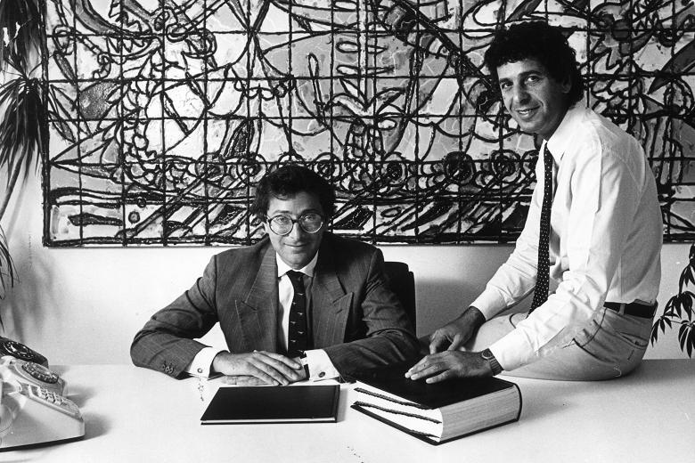 Charles Saatchi: From right to left: Charles and Maurice Saatchi at their office, 1986. The Times.
