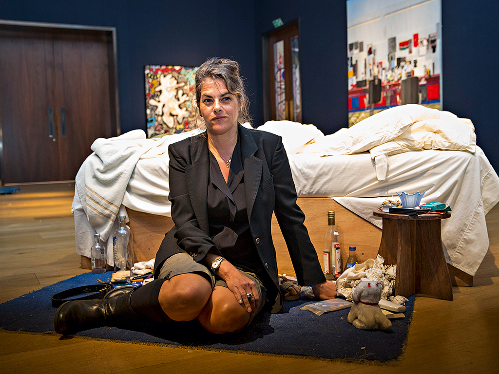 Charles Saatchi: Tracey Emin with her work My Bed (1998). Rob Stothard/Getty Images.
