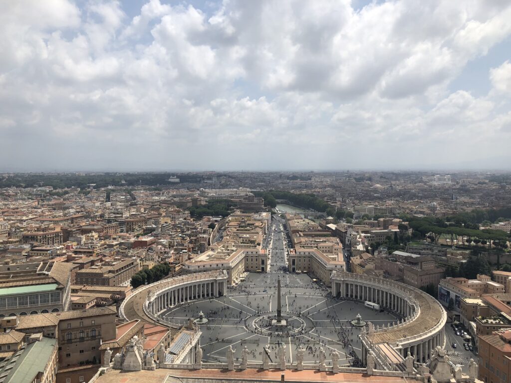 St. Peter’s Basilica: View of St. Peter’s Square from the Dome of St. Peter’s Basilica. Author’s Photograph.
