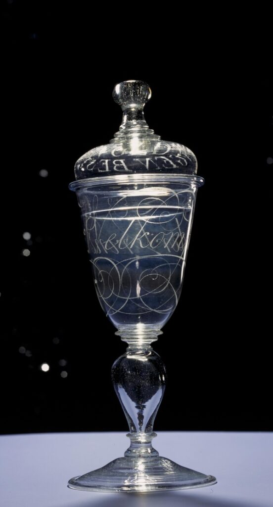 Glass jar with lid; design and phrasing inscribed into glass. Dutch Golden Age Women ARtists.