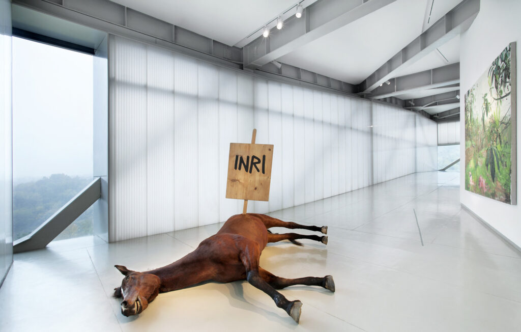 Chinese museums: Maurizio Cattelan, Untitled, 2009, Sifang Art Museum, Nanjing, China. ArchDaily.
