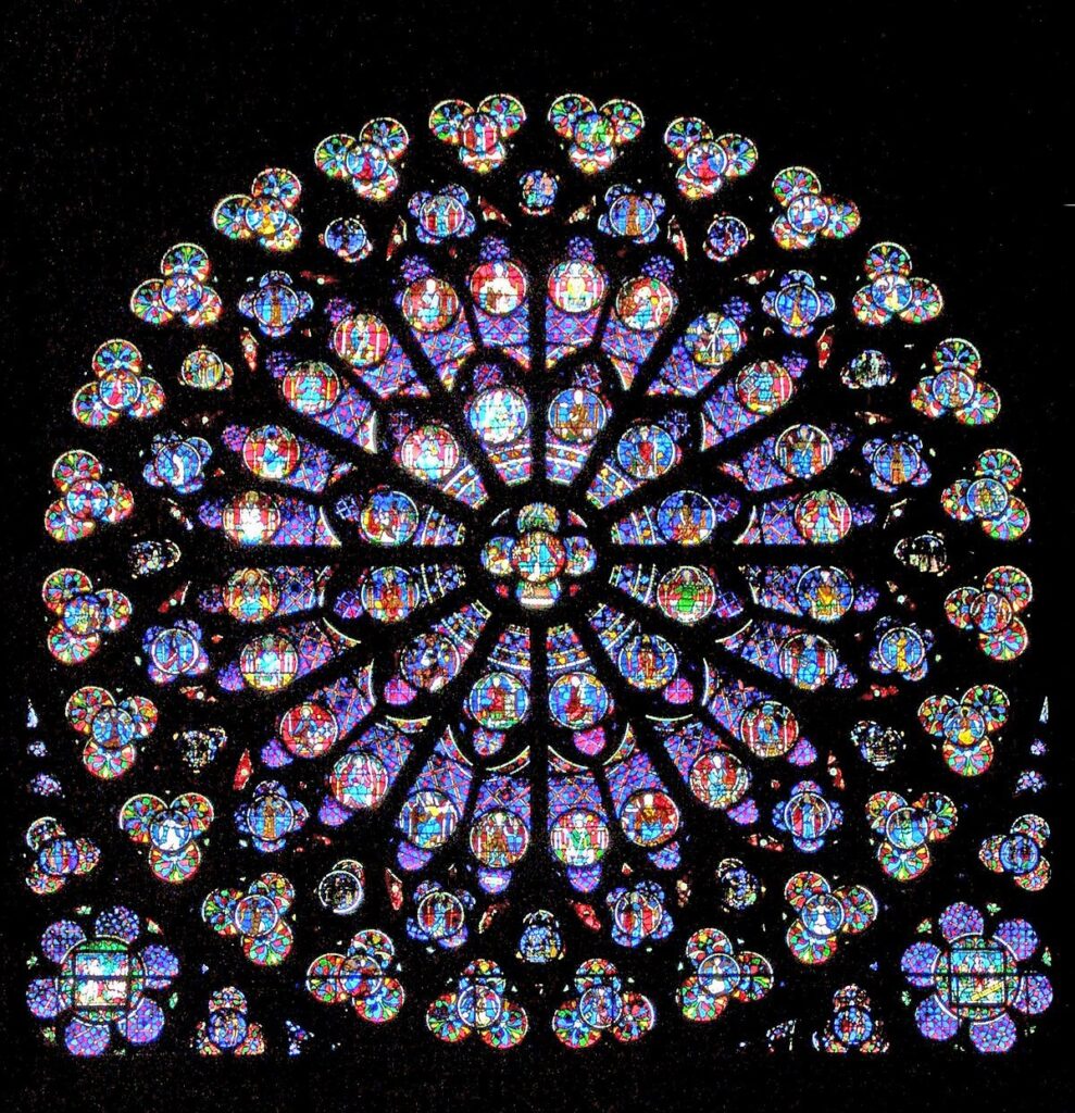 stained glass windows: Jean de Chelles and Pierre de Montreuil, South rose window, 1260, Notre Dame Cathedral, Paris, France. Photo by Albertus teolog via Wikimedia Commons.
