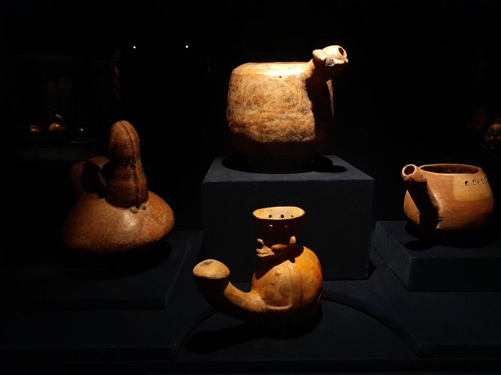 museo larco: Pottery bottles shaped like male genitalia, Vicus culture (1250 BCE–1 CE), Moche culture (1 CE–800 CE), and Lambayeque culture (800 CE–1300 CE) Peru, Museo Larco, Lima, Peru. Photo by author.
