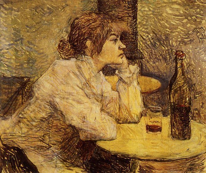 Profile of a white woman with dark hair leaning on her elbows resting on a table. A wine glass and bottle sits in front of her.