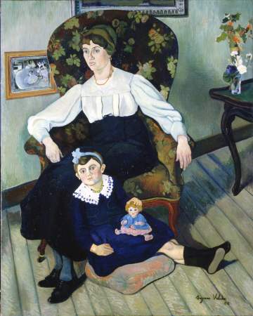 Suzanne Valadon Barnes Foundation: An interior scene of a young white woman sitting in an armchair as a young white girl sits on the floor leaning on the woman's legs. The girl holds a doll in her lap. On the wall is a picture created by Edgar Degas.