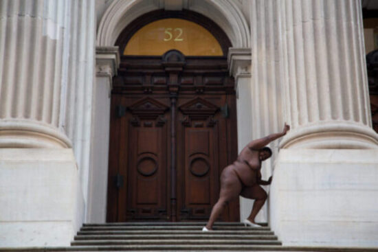 Nona Faustine: Nona Faustine, They Tagged the Land with Trophies and Institutions from Their Rapes and Conquests, 2013, Tweed Courthouse, New York, NY, USA. Image courtesy of the artist and MACK.
