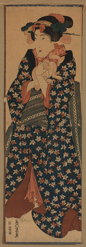 A Japanese woodcut that shows a young woman holding a cat against her shoulder.