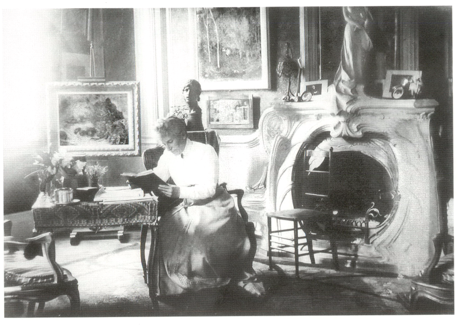 Anna Boch, around 1903, sit next to her  fireplace designed by Victor Horta, Mettlach Ceramic Museum, Mettlach, Germany.