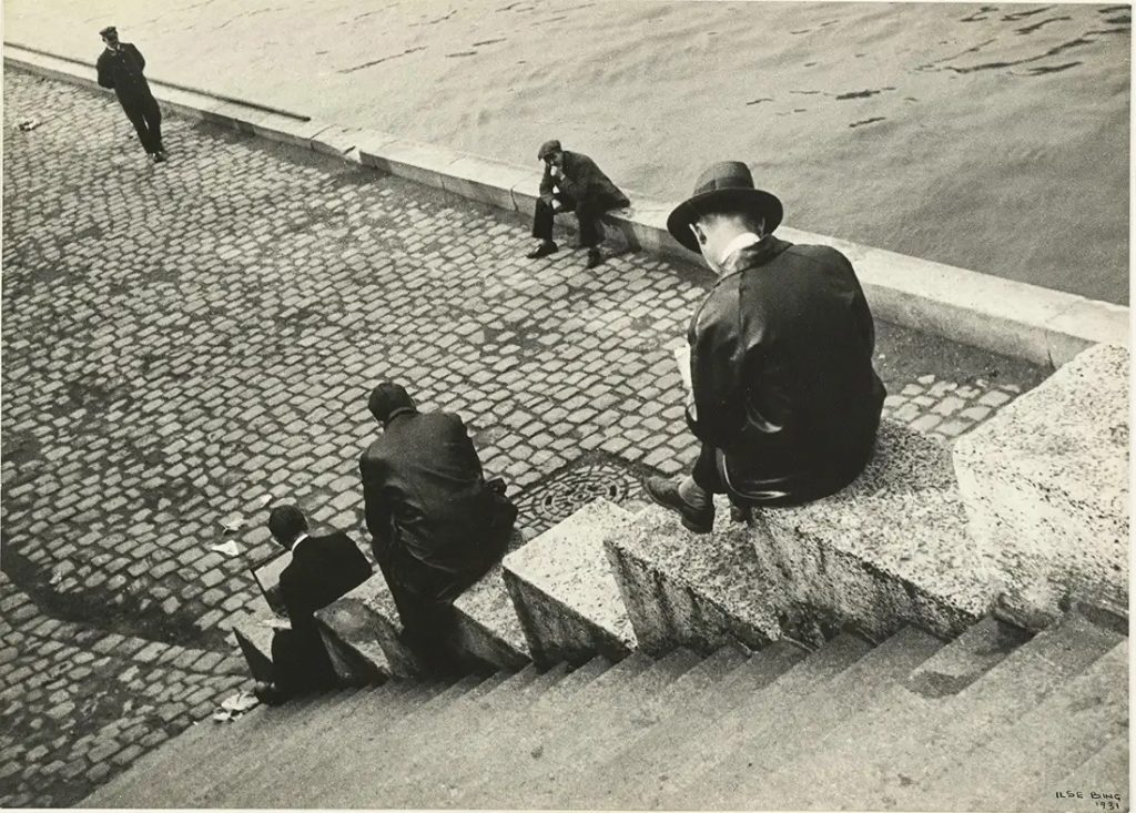 female photographers: Ilse Bing,Three Men Sitting on the Steps by the Seine, 1931, Victoria and Albert Museum, London, UK. Museum’s website.
