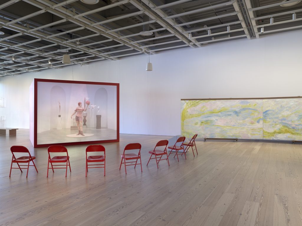 Installation view of Whitney Biennial 2022: Quiet as It’s Kept (Whitney Museum of American Art, New York, April 6-September 5, 2022). From left to right: Alex Da Corte, ROY G BIV, 2022; Leidy Churchman, Mountains Walking, 2022. Photograph by Ron Amstutz