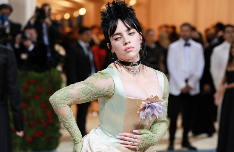 Met Gala fashion art: Billie Eilish in Gucci corset gown attending the Met Gala 2022, The Metropolitan Museum of Arts, New York, NY, USA. Photo by Theo Wargo/WireImage. Billboard.
