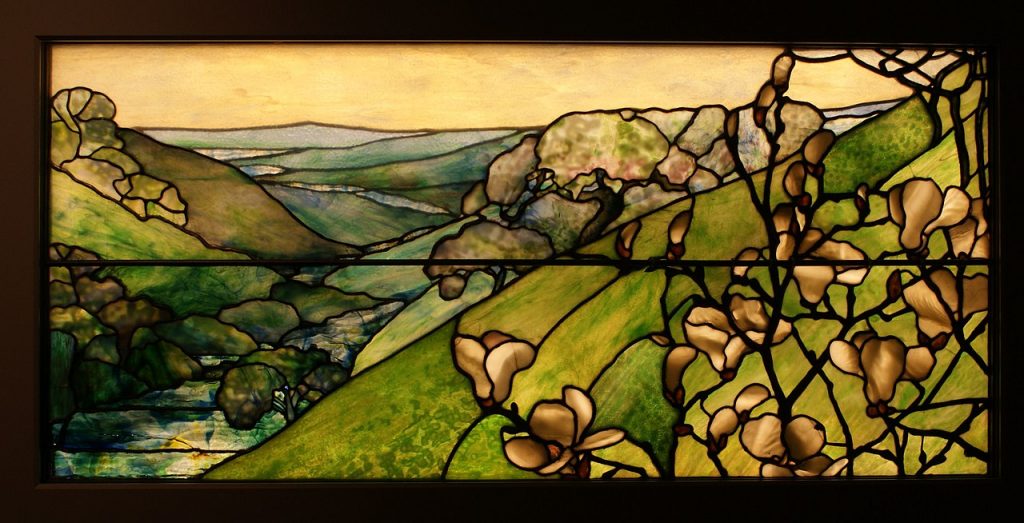 Tiffany Glass: Tiffany Studios, Landscape Window, ca. 1910-1920, New York Historical Society, New York, NY, USA. Photograph of Griannan via Flickr/Wikimedia Commons (CC-BY-2.5).
