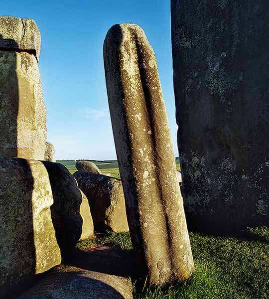 Stonehenge: One of the bluestones at Stonehenge, with a line shaped to fit together with other stones. English Heritage.
