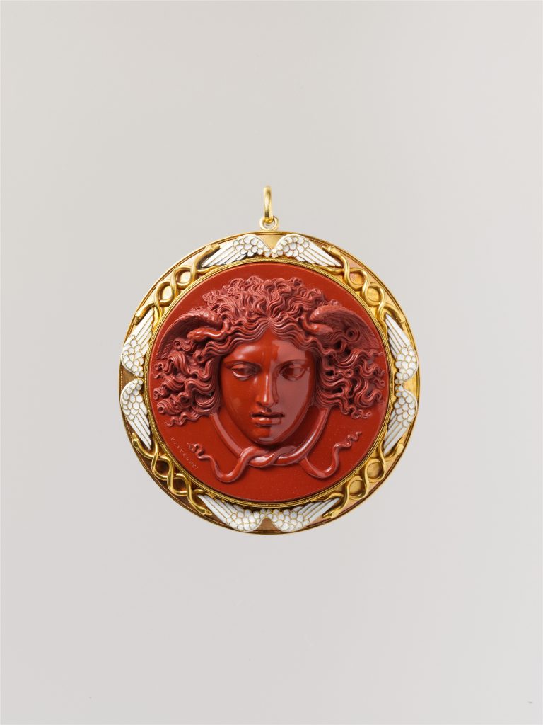 Cameo by Benedetto Pistrucci; mount by Carlo Giuliano, Head of Medusa, red jasper mounted in gold with white enamel. The Metropolitan Museum of Art, New York, NY, USA.