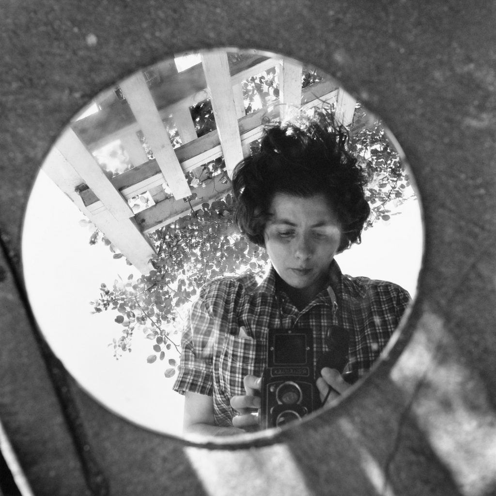 Vivian Maier: Vivian Maier, Self-Portrait, New York, 1953. © Estate of Vivian Maier, Courtesy of Maloof Collection and Howard Greenberg Gallery, New York, NY, USA.
